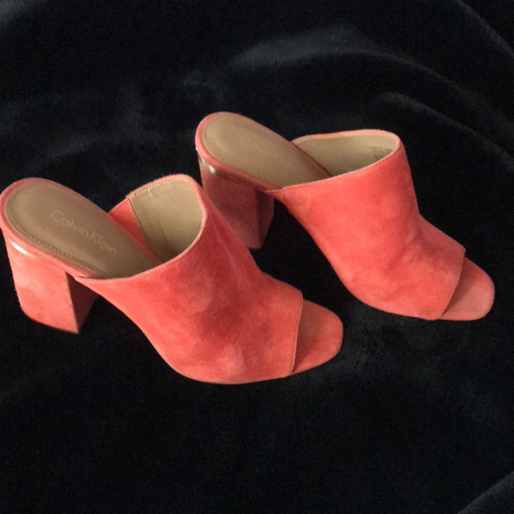 Calvin Klein block heeled mules.